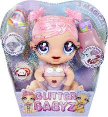 Muñeca Glitter Babyz: Dreamia Stardust con 3 Accesorios